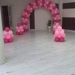 مجموعة بالونات هيليوم باللون الوردي